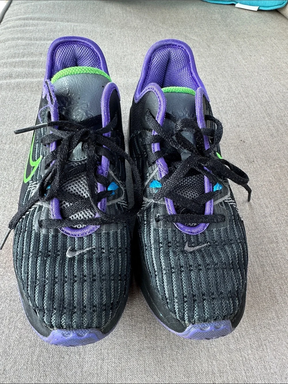 Nike Black Sneakers with Purple Lining and Green Swoosh